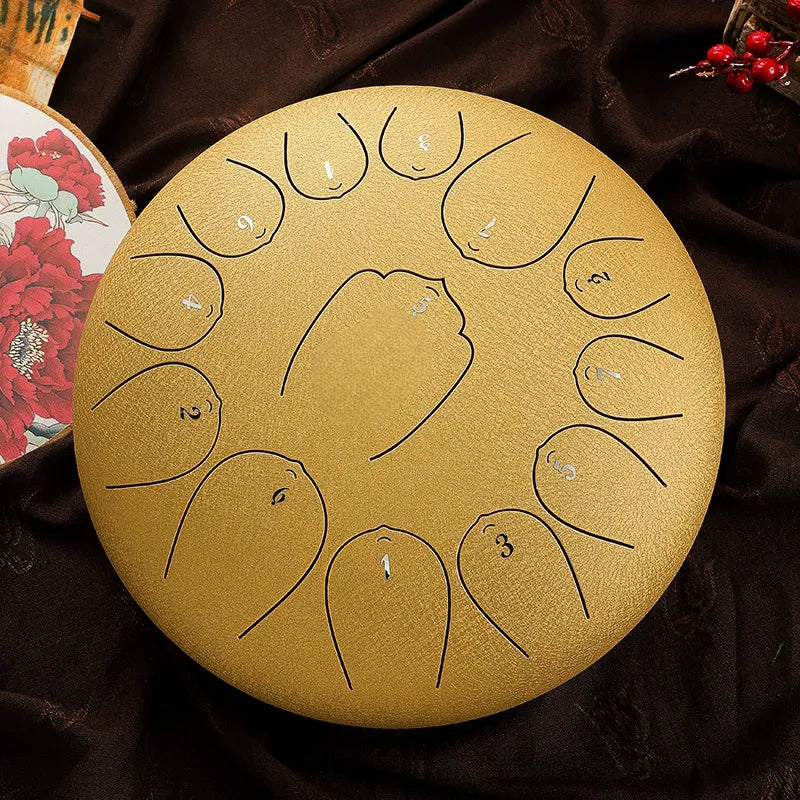 A sleek Champagne Gold MoralGain 12-inch 13-note D-Key steel tongue drum. A professional handpan for sound therapy.
