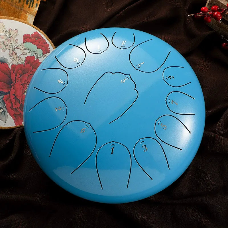 A peaceful, serenity blue MoralGain 12-inch 13-note steel tongue drum, a perfect handpan for relaxation and meditation.