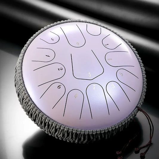 A gentle Blush Lavender MoralGain 13-inch 15-note titanium steel tongue drum. The perfect handpan for deep meditation and sound healing.
