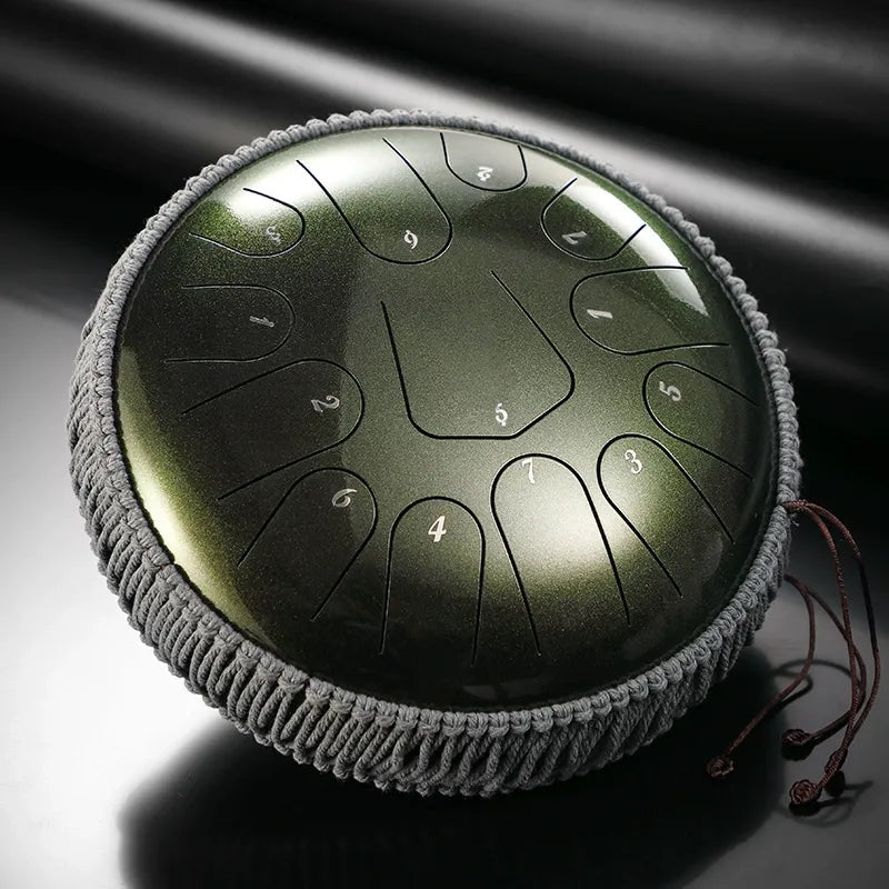 A unique Patina Green MoralGain 13-inch 15-note titanium steel tongue drum. The perfect instrument for a distinctive sound and aesthetic.