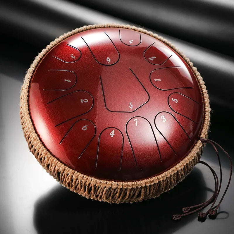 A rustic Terra Cotta Red MoralGain 13-inch 15-note titanium steel tongue drum. Great for creating warm and soulful melodies.