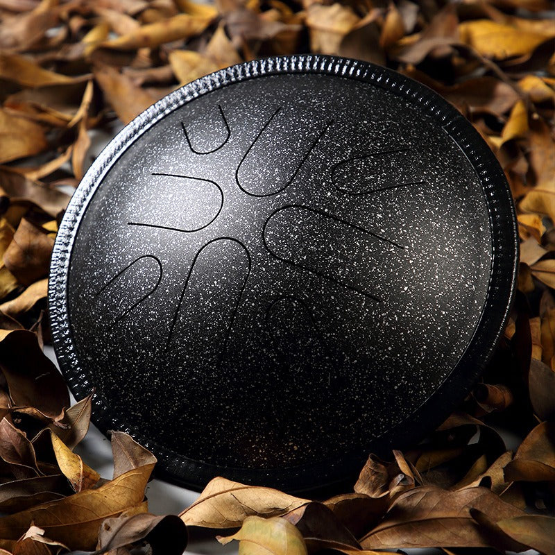 The Midnight Galaxy MoralGain Legacy 10-inch 8-note handpan, a luxurious instrument with a mesmerizing, star-like finish.