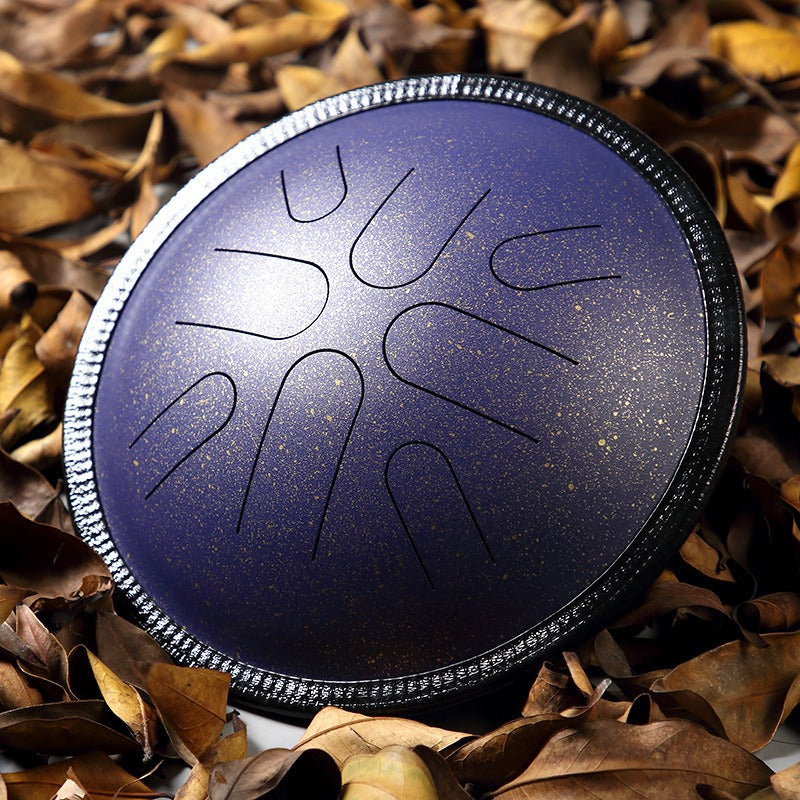 The Nebula Amethyst MoralGain Legacy 10-inch 8-note handpan, a collector's item with a stunning cosmic-inspired finish.