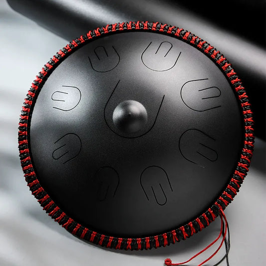 A deep Abyssal Void MoralGain Legacy 16-inch 9-note handpan-style steel tongue drum. The ultimate instrument for a rich, layered sound.