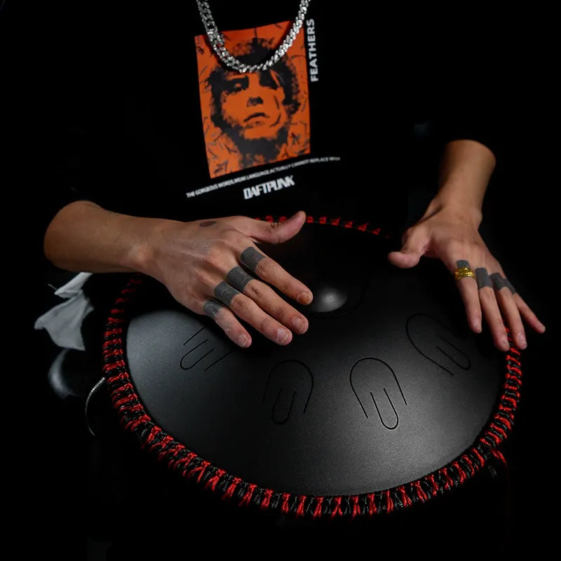 A close-up shot of a hand playing the MoralGain Legacy handpan-style drum, highlighting the unique tactile experience and rich tone produced by hand-striking.