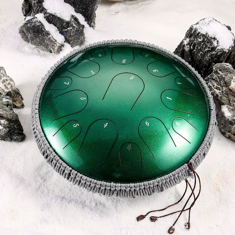 A brilliant Tourmaline Green MoralGain Master 14-inch 15-note handpan. Its jewel-like color reflects the precious, studio-grade tones produced by this professional-grade instrument.