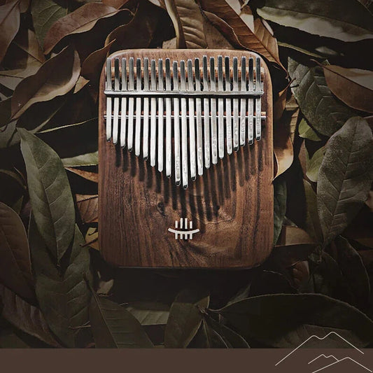 MoralGain Master 21-key round-edge flat board kalimba made of black walnut and maple for extended musical range.