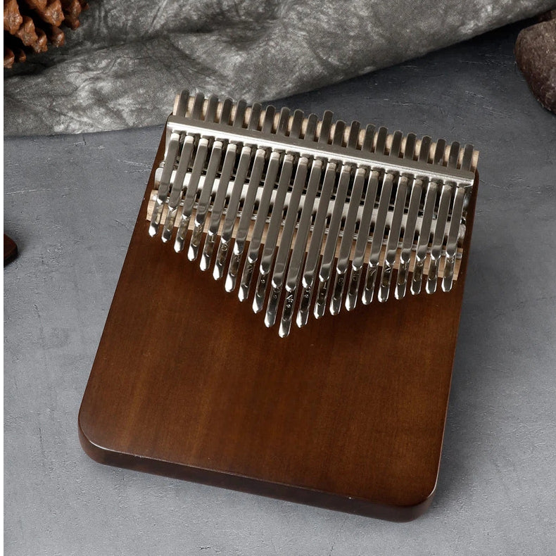 MoralGain® Legacy 42-Key chromatic kalimba made from premium solid black walnut wood, featuring a dual-row professional key layout on a minimalist flat-board design.