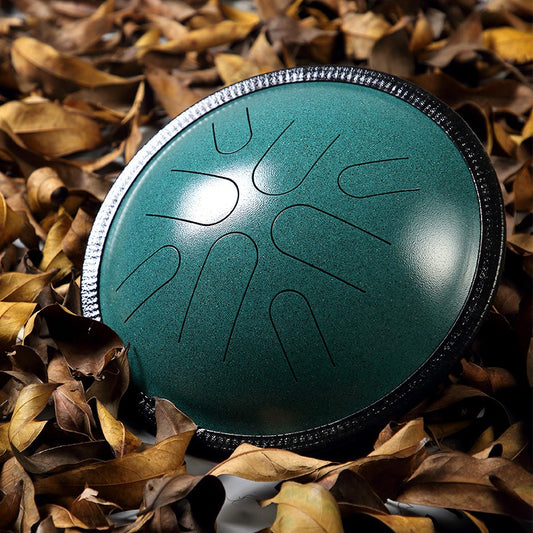  The Jadeite Whisper MoralGain Legacy 10-inch 8-note portable handpan, its exquisite green hue reflecting its pure, layered sound.