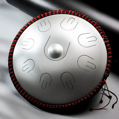 A stunning Cosmic Silver MoralGain Legacy 16-inch 9-note handpan-style steel tongue drum. An exquisite hand-played instrument.