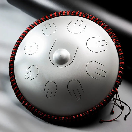 A stunning Cosmic Silver MoralGain Legacy 16-inch 9-note handpan-style steel tongue drum. An exquisite hand-played instrument.