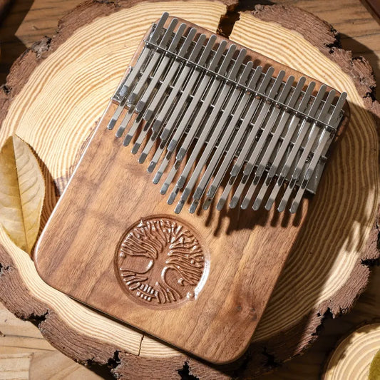 Main image of the MoralGain® Legacy 38-key dual-row kalimba, crafted from solid black walnut, showcasing its luxurious feel and unique double-row key design.