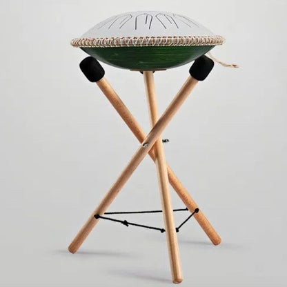 A complete view of the MoralGain Legacy handpan on its display stand, with mallets, showcasing its elegance and readiness for both play and exhibition.