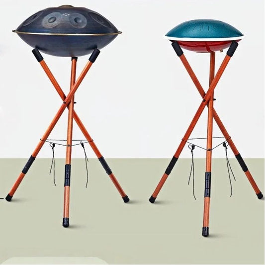 A picture of the MoralGain® wooden handpan stand with a handpan on it, showcasing the stand's overall appearance and adjustable height. Suitable for playing both tongue drums and handpans.